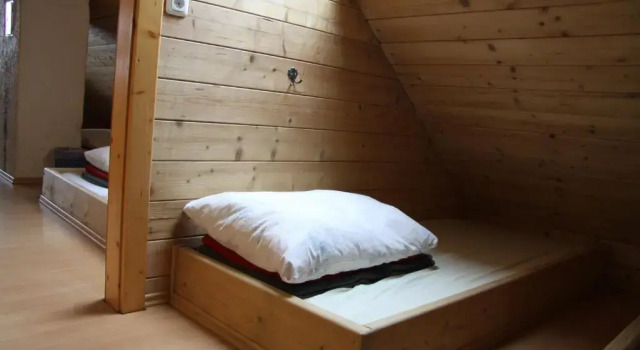 Кровать в общем номере Lodge am Krippenstein