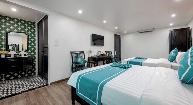 Номер Deluxe Vũ Hotel