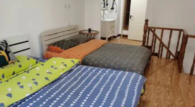 Кровать в общем номере Harbin Yuanbo'ao Hotel Apartment (Xingguangyao Branch)