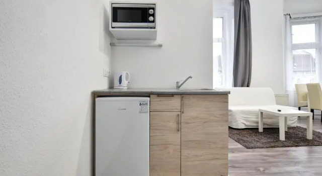 Апартаменты c 1 комнатой с балконом Heart of Downtown Apartment