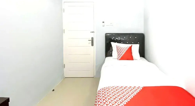 Номер Economy Hotel O Guesthouse Pagi Sore Syariah