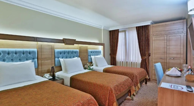 Трёхместный номер Budo Hotel