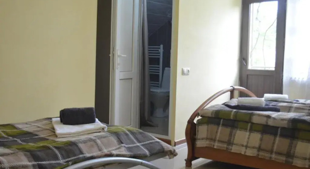 Трёхместный номер Standard с балконом и с красивым видом из окна Alexs Cosy Guesthouse