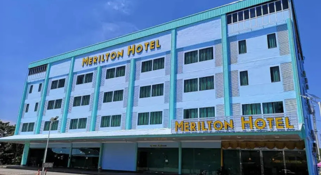 Кровать в общем номере Merilton Hotel