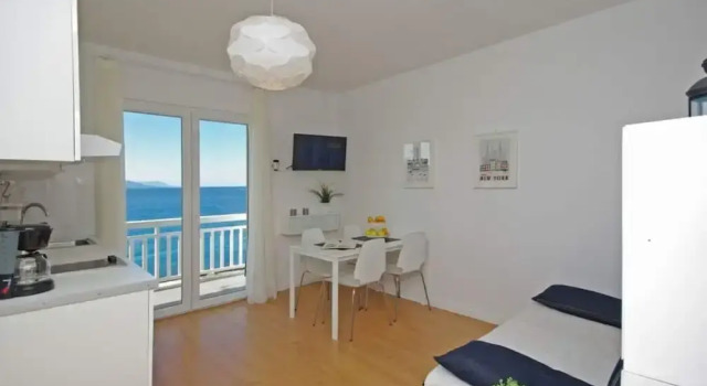 Апартаменты Holiday Apartment Beach House IVA App.1