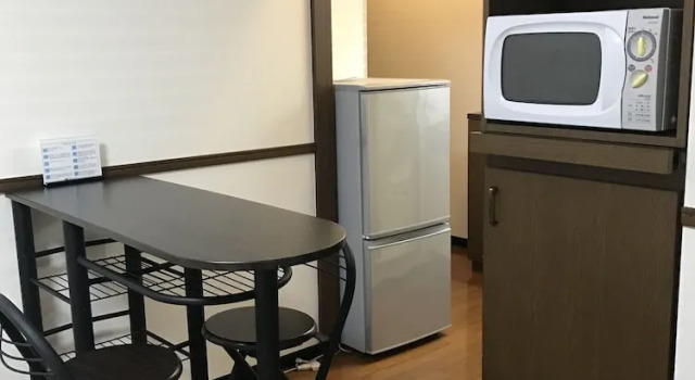 Двухместный номер Economy с балконом Weekly & Monthly City Inn Kokura