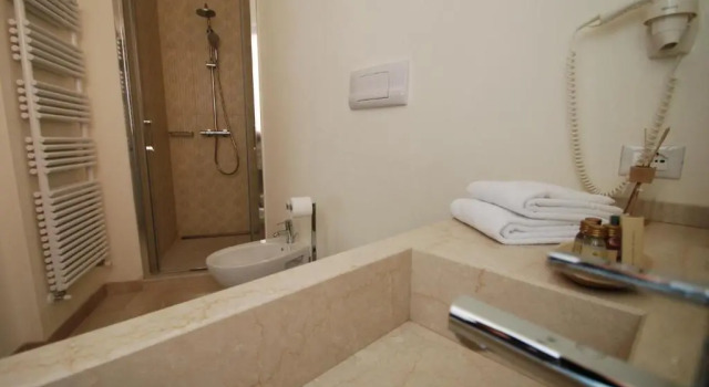 Номер Comfort Aromi Piccolo Hotel
