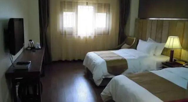 Kunming Lazy Hotel, Rezerwuj Hotel Hotele w Kunming z parkingiem, Parking