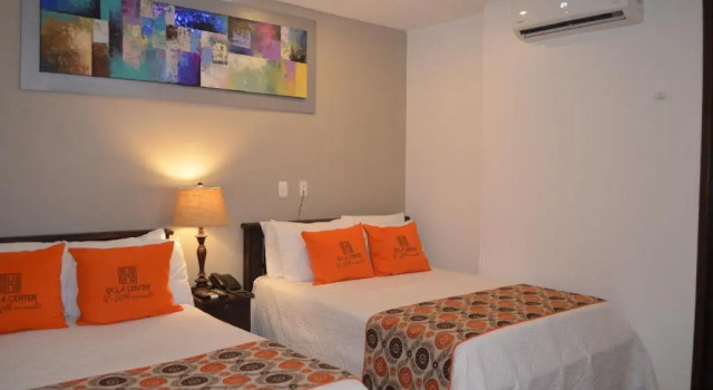 Standard quadruple chambre Hotel Ucla Center