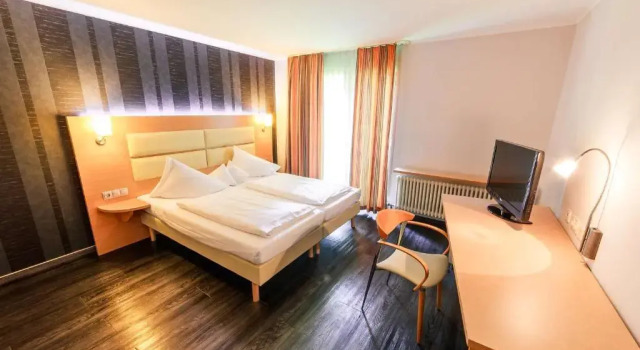 Двухместный номер Standard PLAZA INN Stuttgart-Ditzingen