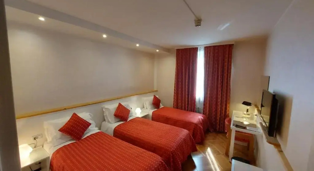 Трёхместный номер Hotel Posta 77