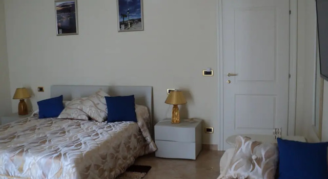 Четырёхместный номер Deluxe с балконом и с красивым видом из окна Airport House B&B