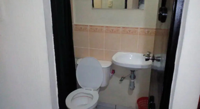 Кровать в общем номере Hotel Latino