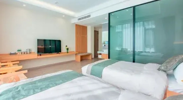 Кровать в общем номере Dali Yushan Heyue Homestay