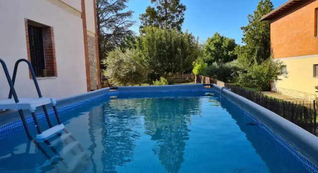 Апартаменты Raffinata casa con wifi e giardino immersa nel verde "VAL D'ORCIA DELUXE"