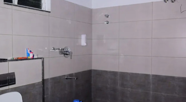 Кровать в общем номере Shree Kalya Resort- Chikmagalur