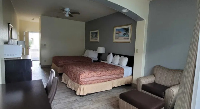 Casa Bella Hotel and Suites, Забронировать Отель Отели Саут-Падре-Айленд с парковкой, рядом с Andy Bowie Park, Парковка