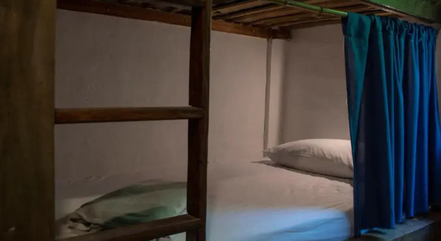 Cama en dormitorio compartido Cinnamon House