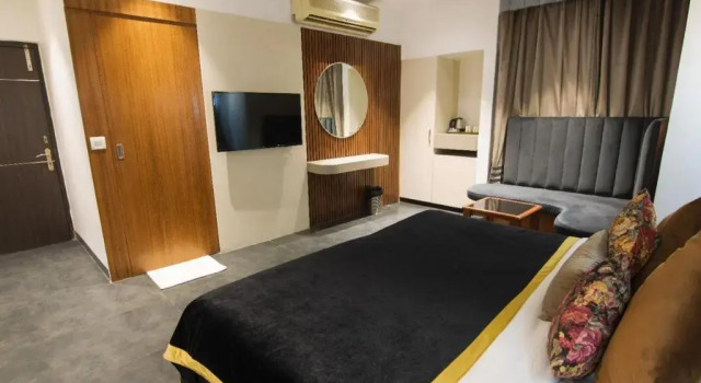 Кровать в общем номере Hotel Sri Nanak Continental