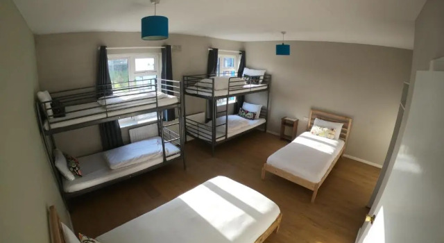 Кровать в общем номере Rougey Lodge Hostel
