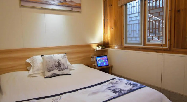 Номер Classic Nanjing Tulou Yunshuiyao Sheying Homestay