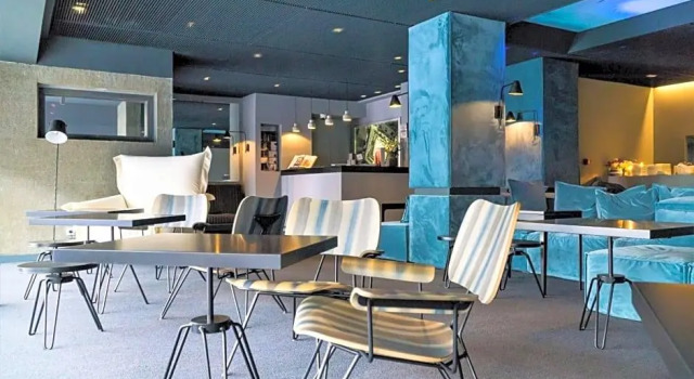 Кровать в общем номере Мансарда Periscope, a Member of Design Hotels
