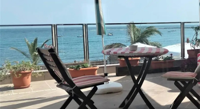 Апартаменты Apartamento con encanto en la playa frente al mar "Posada Rent House"