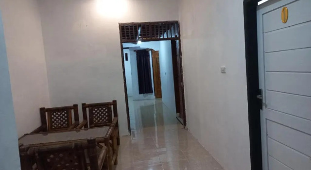 Кровать в общем номере Bukitlawangtour and Accomodation