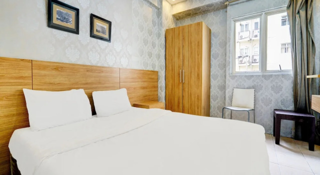 Номер Deluxe OYO Life 93086 Apartemen The Suite Metro By Abbah Property