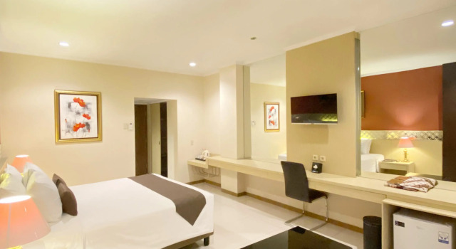 Deluxe Einzel Zimmer The Amrani Syariah Hotel