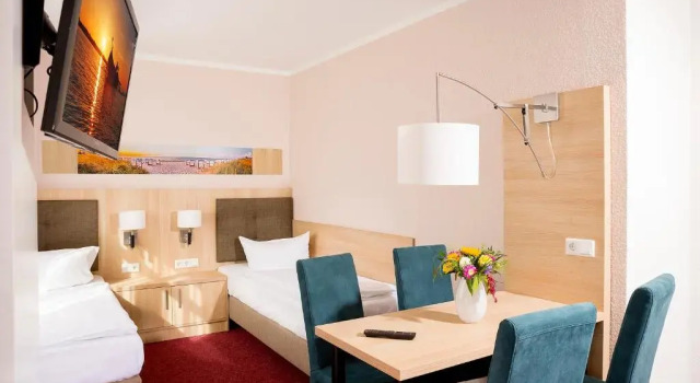 Четырёхместный номер Standard Garni Eden Hotels