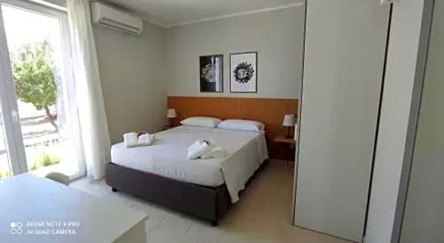 Contrada Specchia Rooms, Забронировать Отель Каровиньо Долина Итрии