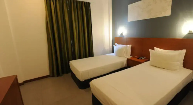 Camera tripla Economy Inn Luanda