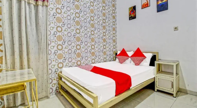 OYO 91429 Butterfly Kost, Prenota Hotel Hotel a Tulungagung con parcheggio, Parcheggio