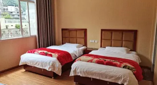 Baoxing Xinyuan Hotel