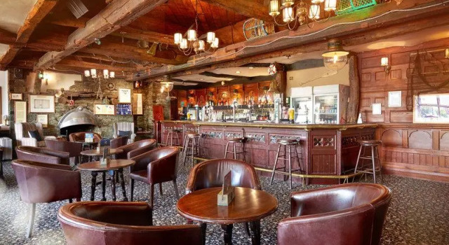 Кровать в общем номере The Hillcrest Hotel