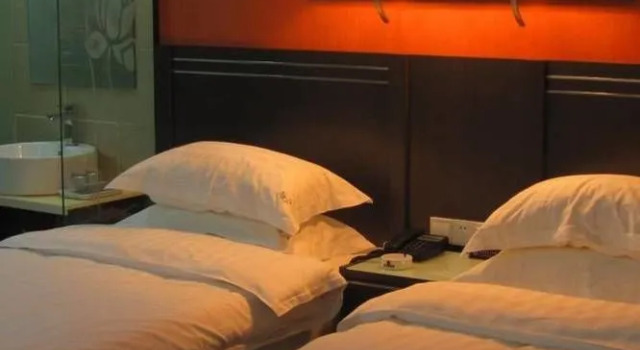 Huayi Business Hotel, Book Hotel Jiyuan Henan