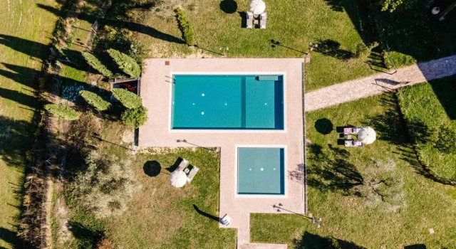 Апартаменты Appartamento in casale con piscina Casa I Pavoni