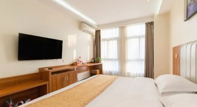 Yi Cheng Hotel, Rezervovat Hotel Čeng-čou Henan