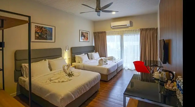 Четырёхместный номер Deluxe Aman Tioman Beach Resort