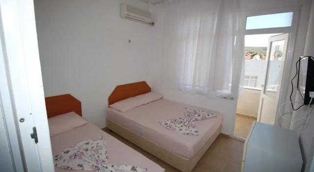 Standardowy czteroosobowy pokój 2 sypialnie z widokiem na ogród Omer Deniz Motel