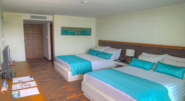 Четырёхместный номер Standard с балконом Estelar Playa Manzanillo - All inclusive