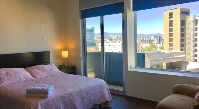 Номер Comfort Napoles Condo Suites