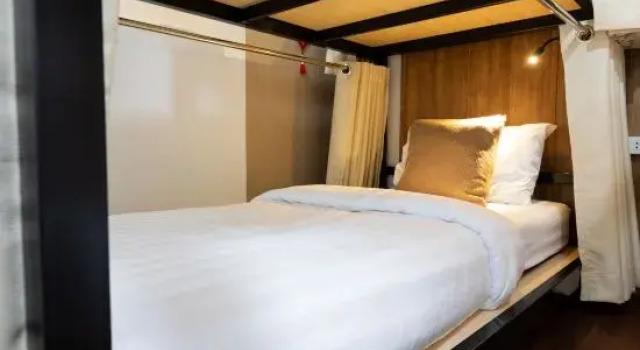 Кровать в общем номере The Grace Hotel Shanghai Yexie