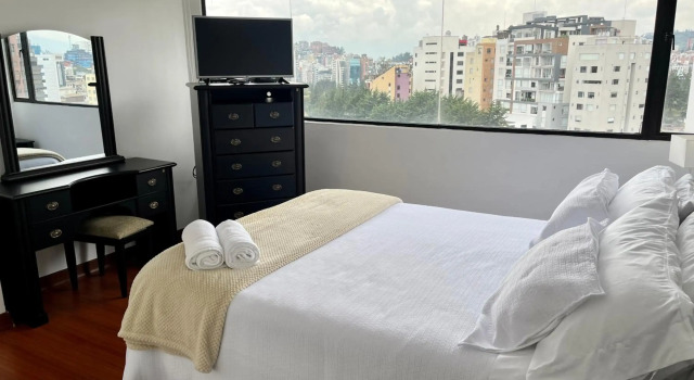 Cómoda suite amoblada nueva a estrenar, con vistas Sector La Carolina, aparcamiento privado