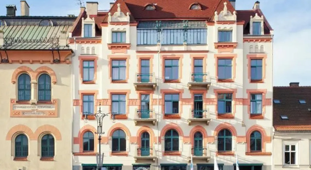 Кровать в общем номере с 2 комнатами Antique Apartments Plac Szczepański