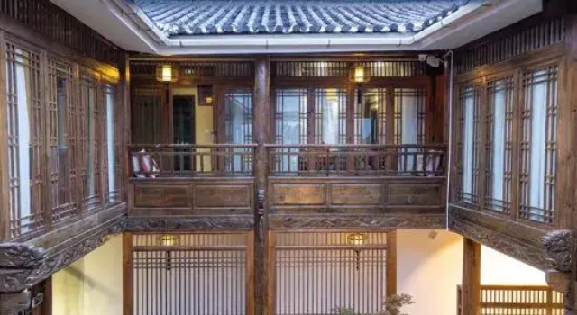 Lijiang Ancient City Xishan Tea House Inn, Забронировать Отель Лицзян Юньнань, рядом с Улица Сквер-стрит Древнего города Даянь