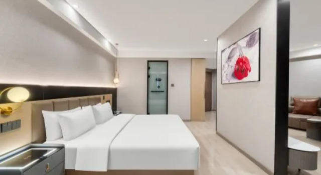 Люкс Business Huayue Hotel (Shaoxing Shengzhou Pukou Town)