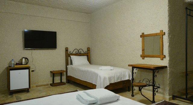 Трёхместный люкс с 3 комнатами Отель Nirvana Cave House