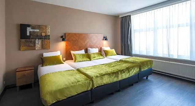 Четырёхместный номер The Alfred Hotel